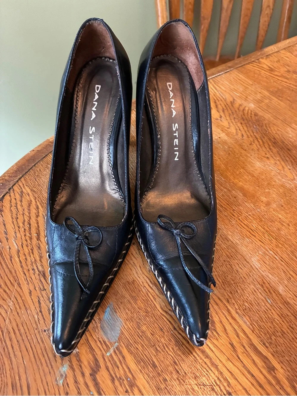 Black Pointed Leather Heels with Bow Accent